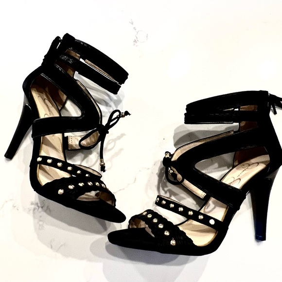 Strappy black dress sandal w/ gold studs and fringe ties by Jessica Simpson. - Picture 2 of 7